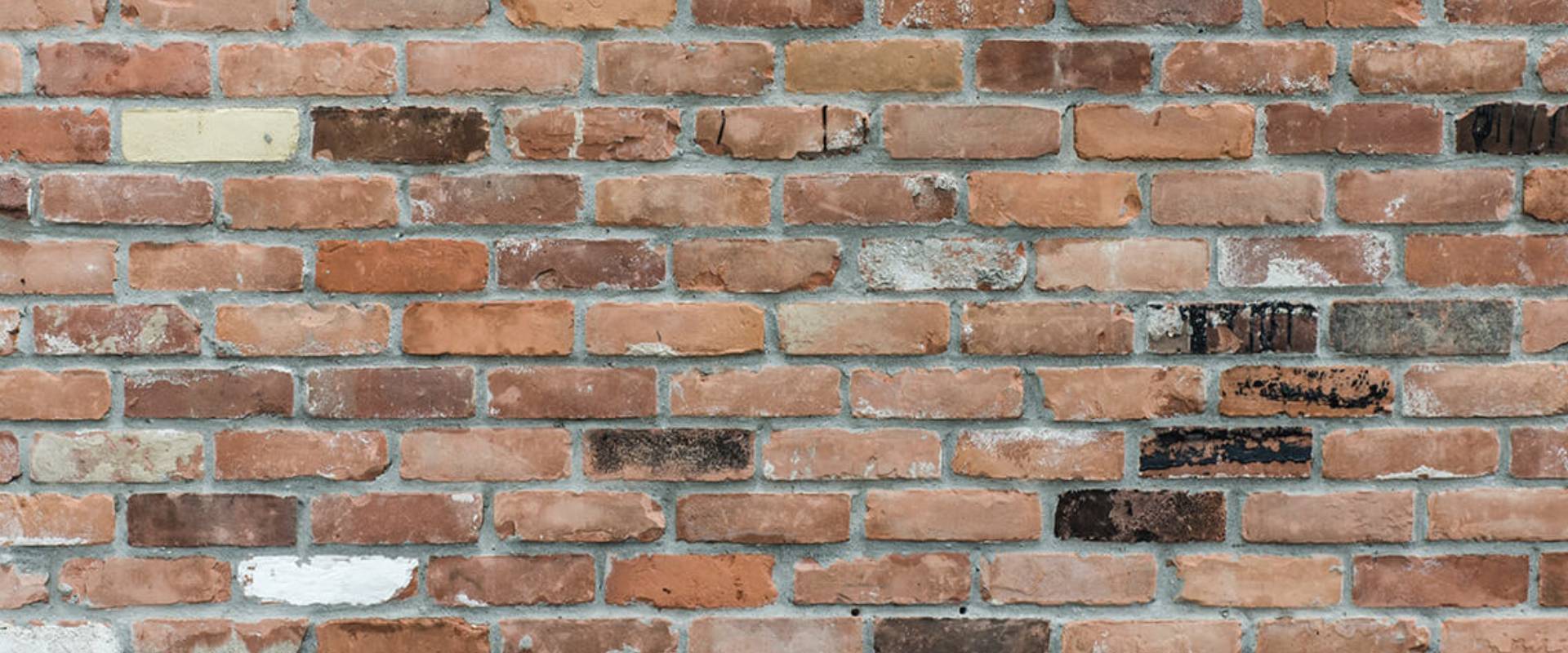 Kostenefficiënt scheurherstel appartementencomplex door vakspecialisten